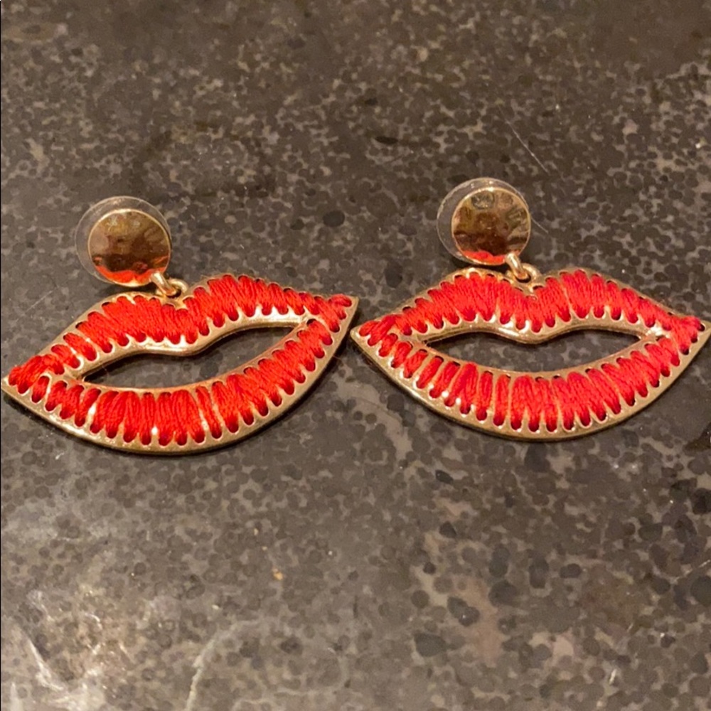Never worn lip earrings